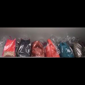 My handbags & wallets are stuffed and stored in bags.